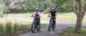 Photo of a couple biking at Lacombe Lake Park