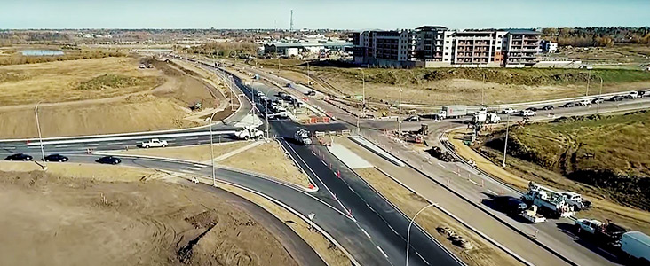 Aerial view of Ray Gibbon Drive and Leclair Way intersection during phase 1 of construction