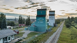 Aerial view of St. Albert grain elevators and train tracks.