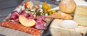 A charcuterie board is presented to eager customers at a St. Albert restaurant.