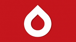 Blood drop on red background