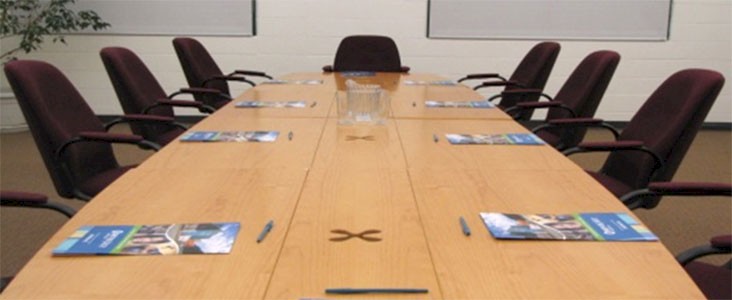 Boardroom meeting at Servus Place